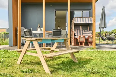 Ein Garten an der Unterkunft Süsel Seeparx Ferienhaus Sunshine