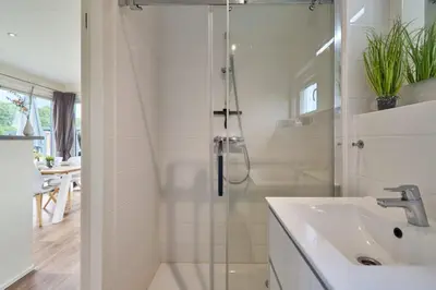 Ein Badezimmer in der Unterkunft Süsel Seeparx Ferienhaus Sunshine