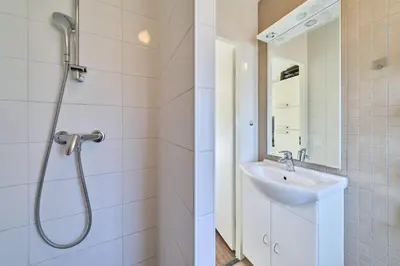 Ein Badezimmer in der Unterkunft Süsel Seeparx Ferienhaus Wellenzauber