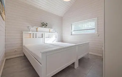 Ein Bett oder Betten in einem Zimmer der Unterkunft Cozy Home In Krems Iiwarderbrück With Sauna