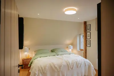 Ein Bett oder Betten in einem Zimmer der Unterkunft Design Hideaway On The Lauenburg Lake District