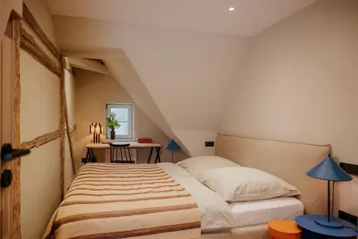 Ein Bett oder Betten in einem Zimmer der Unterkunft Design Hideaway On The Lauenburg Lake District