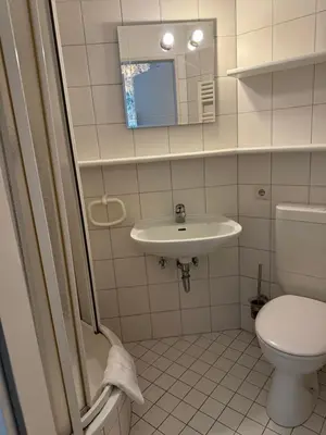 Ein Badezimmer in der Unterkunft Pension Am Burgtor