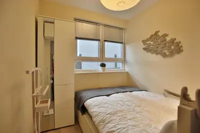 Ein Bett oder Betten in einem Zimmer der Unterkunft Villa Idyll Appartement 11 in der Villa Idyll