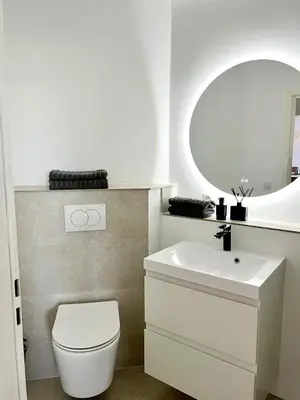 Ein Badezimmer in der Unterkunft Travemünde Ruheoase mit Pool Sauna Parkplatz