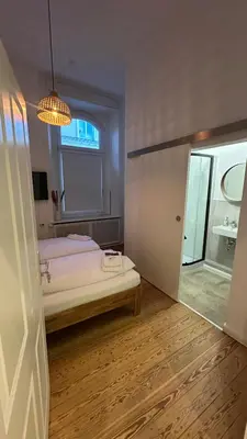 Ein Bett oder Betten in einem Zimmer der Unterkunft Hanse Room Lübeck