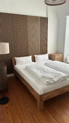 Ein Bett oder Betten in einem Zimmer der Unterkunft Hanse Room Lübeck