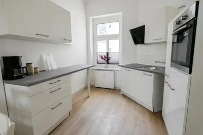 Küche/Küchenzeile in der Unterkunft Helle 2 Zimmer Altbauwohnung in Lübecks Altstadt