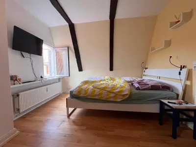 Ein Bett oder Betten in einem Zimmer der Unterkunft Ferienwohnung 