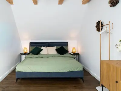 Ein Bett oder Betten in einem Zimmer der Unterkunft Küstenzeit Travemünde