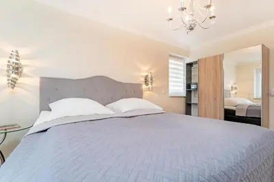 Ein Bett oder Betten in einem Zimmer der Unterkunft Strand Domizil Himmel & Meer