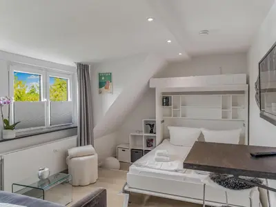 Ein Sitzbereich in der Unterkunft Objekt-Nr 54 - Strand - Strandredder
