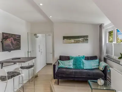 Ein Sitzbereich in der Unterkunft Objekt-Nr 54 - Strand - Strandredder