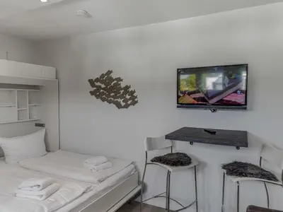 Ein Bett oder Betten in einem Zimmer der Unterkunft Objekt-Nr 54 - Strand - Strandredder
