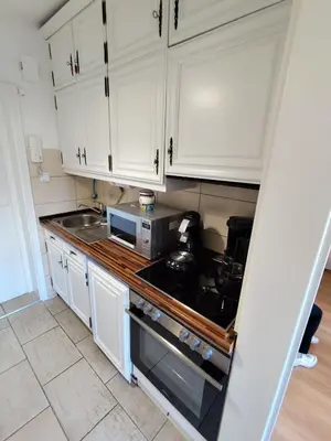 Küche/Küchenzeile in der Unterkunft Ferienwohnung Timmestrand