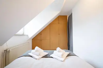Ein Bett oder Betten in einem Zimmer der Unterkunft Ferienwohnung 
