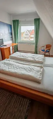 Ein Bett oder Betten in einem Zimmer der Unterkunft Ankerplatz Lichtblick