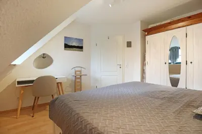 Ein Bett oder Betten in einem Zimmer der Unterkunft Barendorf Padua Ferienwohnung