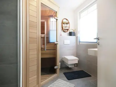 Ein Badezimmer in der Unterkunft Maria Ferienhaus