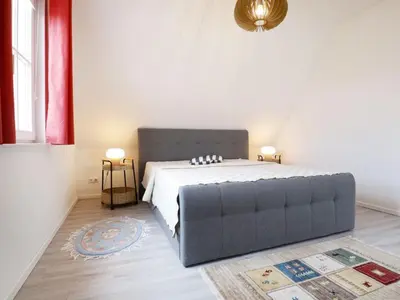 Ein Bett oder Betten in einem Zimmer der Unterkunft Maria Ferienhaus