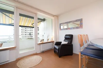 Ein Sitzbereich in der Unterkunft Giny's Beach Appartement