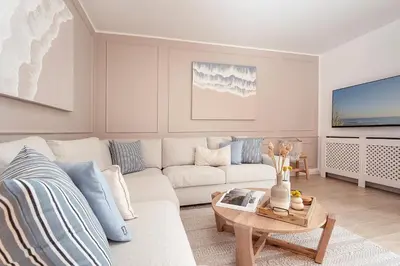 Ein Sitzbereich in der Unterkunft Ferienwohnung Sandweiss Ferienwohnung 01