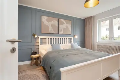 Ein Bett oder Betten in einem Zimmer der Unterkunft Ferienwohnung Sandweiss Ferienwohnung 01