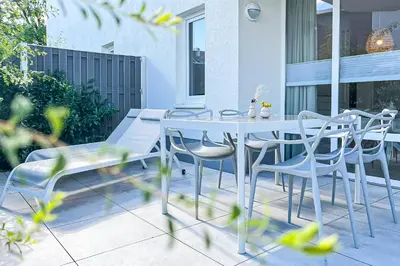 Ein Patio oder anderer Außenbereich in der Unterkunft Ferienwohnung Sandweiss Ferienwohnung 01