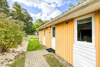Ein Garten an der Unterkunft Schatzkiste - Dorf Ferienhaus 18