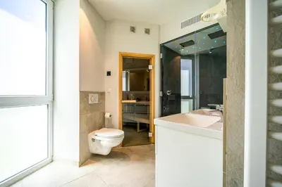 Ein Badezimmer in der Unterkunft Promenadenvilla 03 Wohnung 01