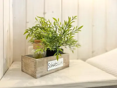 Ein Bett oder Betten in einem Zimmer der Unterkunft Schatzkiste - Dorf Ferienhaus 08