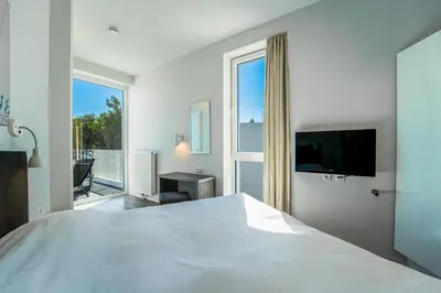 TV/Unterhaltungsangebot in der Unterkunft Promenadenvilla 03 Wohnung 10