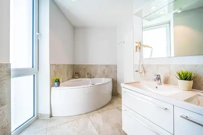Ein Badezimmer in der Unterkunft Promenadenvilla 03 Wohnung 09