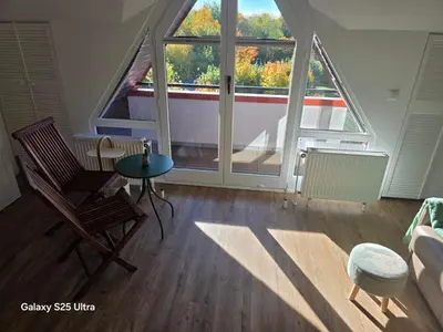 Ein Sitzbereich in der Unterkunft PEMATRA FeWo Kleine Brise