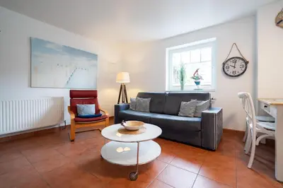 Ein Sitzbereich in der Unterkunft Ferienwohnung 