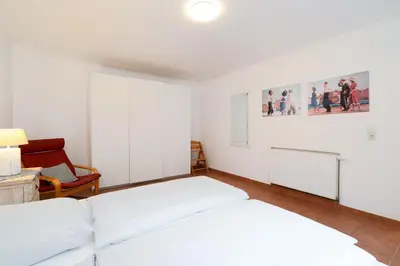 Ein Bett oder Betten in einem Zimmer der Unterkunft Ferienwohnung 