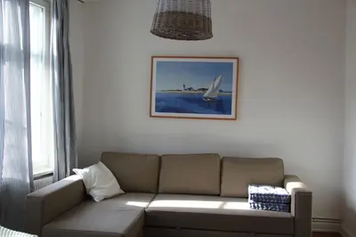Ein Sitzbereich in der Unterkunft Kapitänshaus