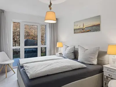 Ein Bett oder Betten in einem Zimmer der Unterkunft Objekt-Nr 111 - Strand - Steuerbord
