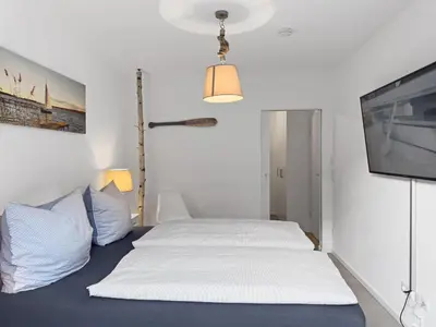Ein Bett oder Betten in einem Zimmer der Unterkunft Objekt-Nr 111 - Strand - Steuerbord