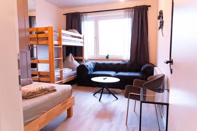 Ein Sitzbereich in der Unterkunft New central 2-3 room apartments with parking near train station & casino
