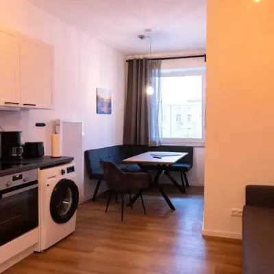 New central 2-3 room apartments with parking near train station & casino