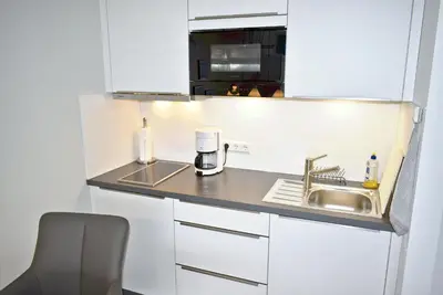 Küche/Küchenzeile in der Unterkunft Strandhotel Appartement Nr 34 Sünnkant