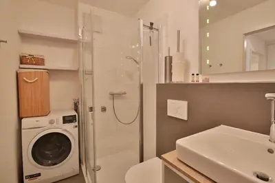 Ein Badezimmer in der Unterkunft Strandglück Haus A Strandglück Appartement 03A 
