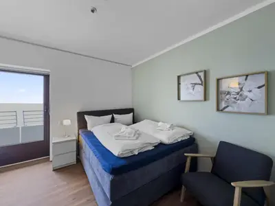 Ein Bett oder Betten in einem Zimmer der Unterkunft Objekt-Nr 153 - Strand - Trelleborgallee