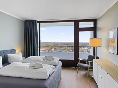 Ein Bett oder Betten in einem Zimmer der Unterkunft Objekt-Nr 153 - Strand - Trelleborgallee