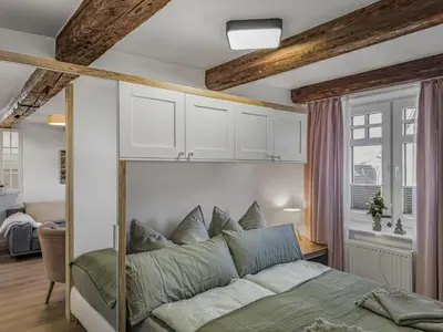 Ein Bett oder Betten in einem Zimmer der Unterkunft Objekt-Nr 242 - Hafen - Kurgartenstraße