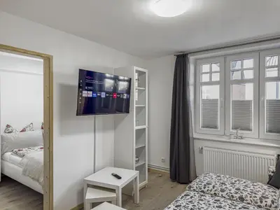 Ein Bett oder Betten in einem Zimmer der Unterkunft Objekt-Nr 240 - Hafen - Kurgartenstraße