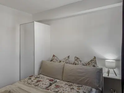 Ein Bett oder Betten in einem Zimmer der Unterkunft Objekt-Nr 240 - Hafen - Kurgartenstraße