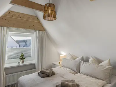 Ein Bett oder Betten in einem Zimmer der Unterkunft Objekt-Nr 244 - Hafen - Kurgartenstraße