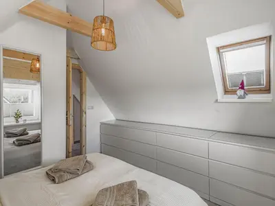Ein Bett oder Betten in einem Zimmer der Unterkunft Objekt-Nr 244 - Hafen - Kurgartenstraße